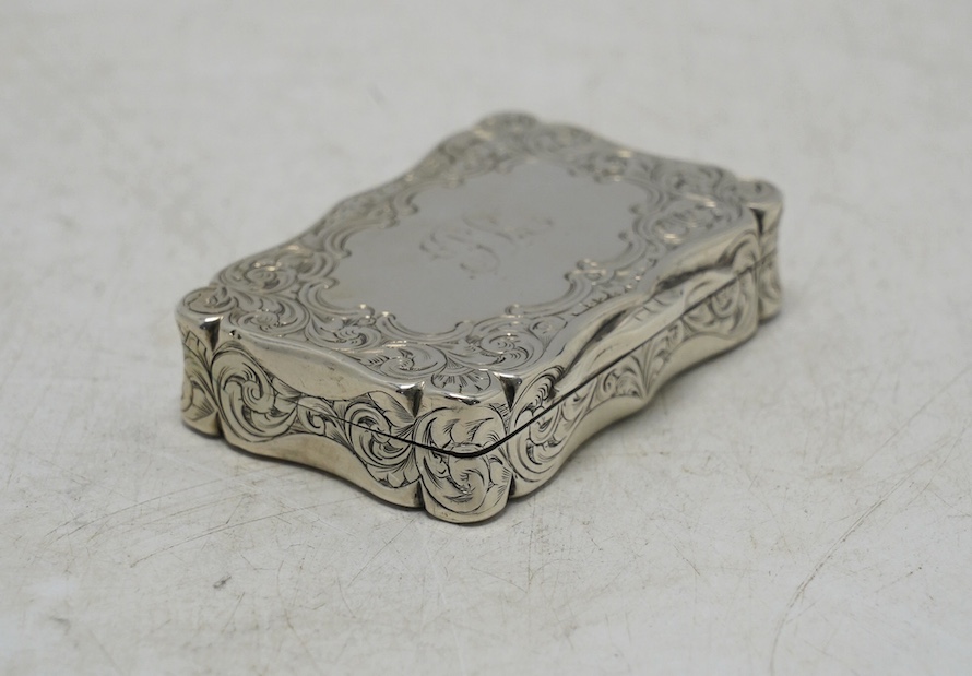 A Victorian engraved snuff box, by George Unite, Birmingham, 1853, 61mm. Condition - fair